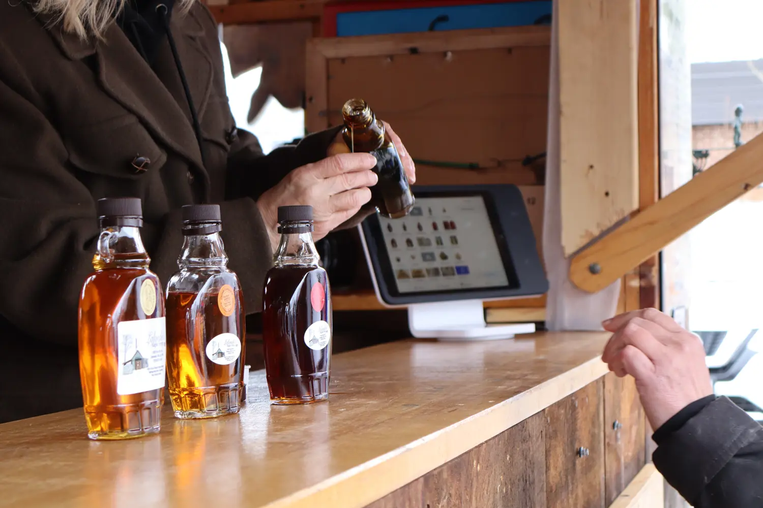 Photo of maple syrup being poured. 